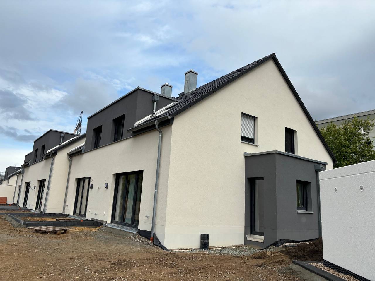 Neubau von 2 x 6 Reihenhäusern  20 Garagen / 8 Stellplätzen